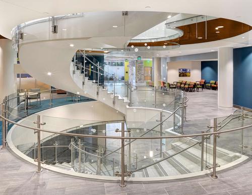 Colorado State University’s medical center - glass railing along interior staircase